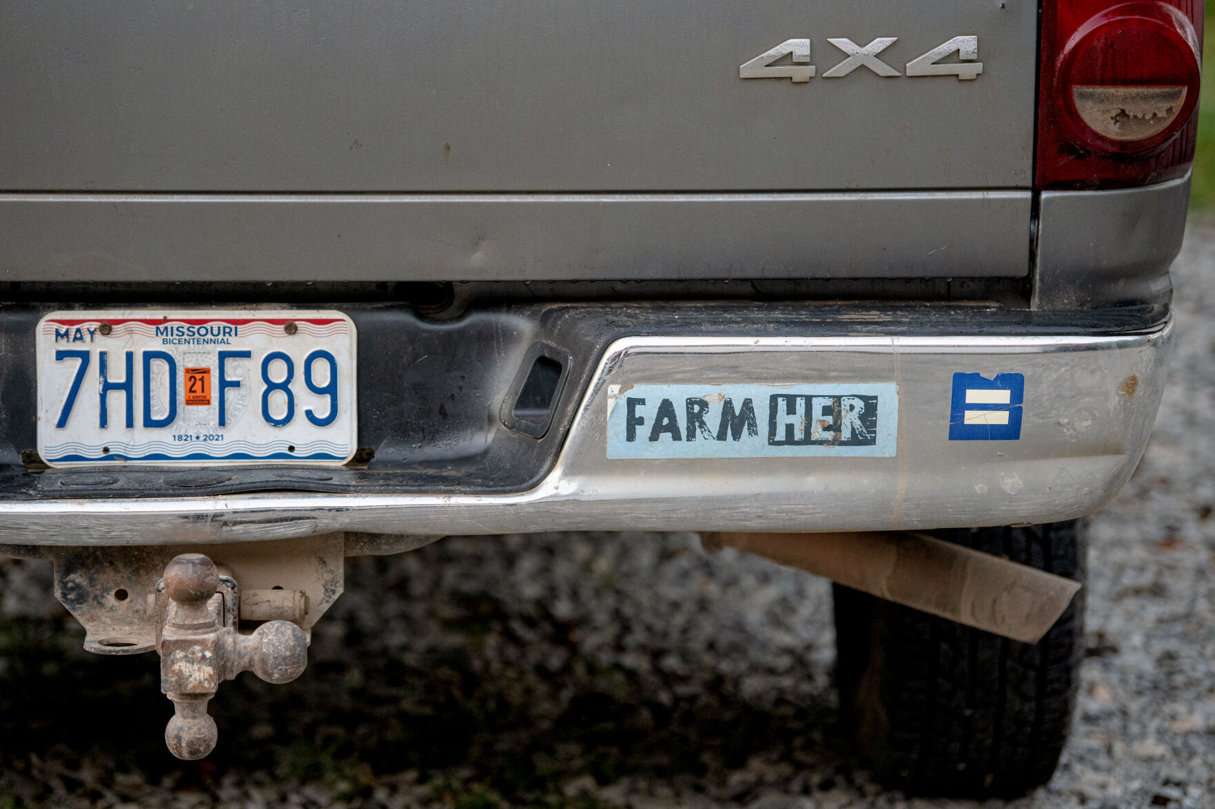 Bumper stickers on one of Liz Graznak’s work trucks
